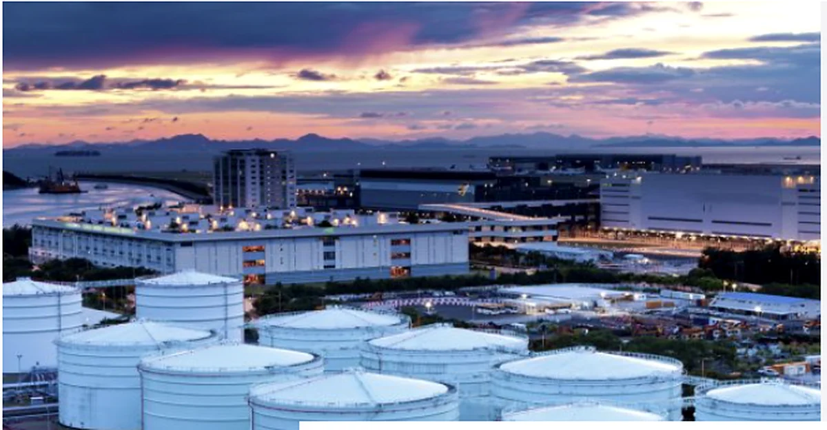 Oil storage facility at sunset